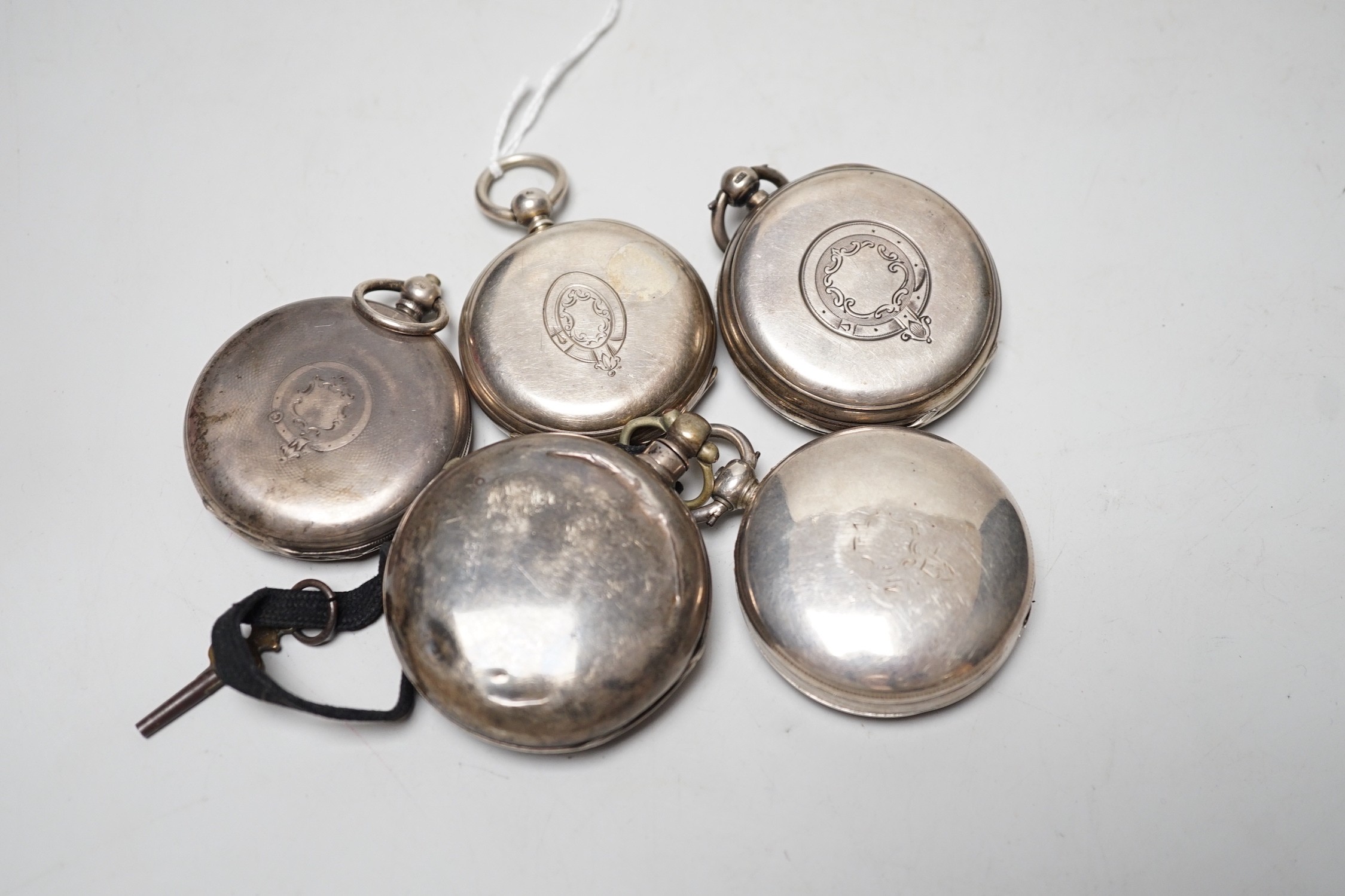 A 19th century silver pair cased keywind verge pocket watch, unsigned movement, together with three silver open faced keywind pocket watches including Fearn, Cornhill and a silver hunter pocket watch by Tanner of Lewes.